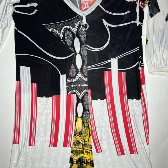 Save the Queen Ladies top. Medium Elbow length sleeves. Metal medallion accent. - Picture 11 of 13